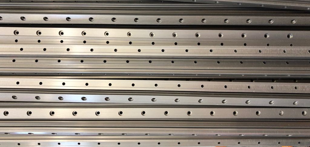 linear rails with holes