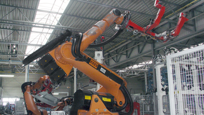 six-axis robots in manufacturing environment