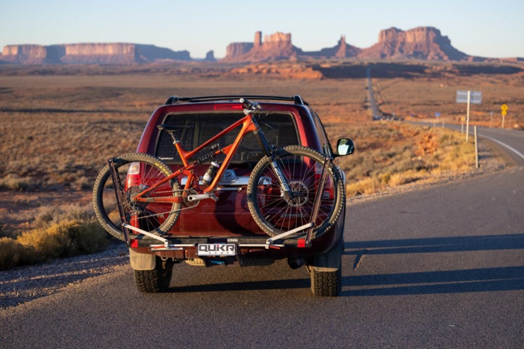 bike rack and bike installed at the back of a vehicle