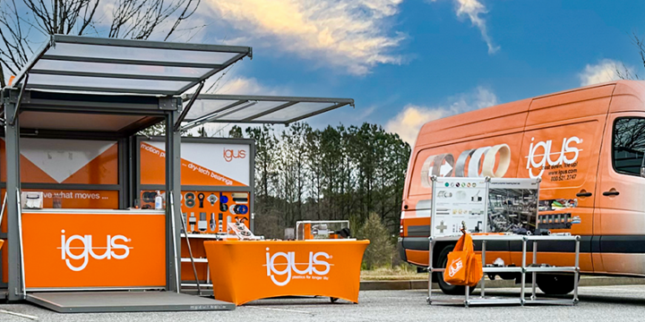 tradeshow booths and an igus van