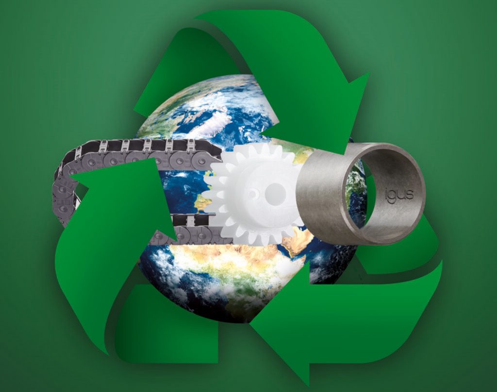 earth with recycling symbol with cable carrier and plastic gear and bearing