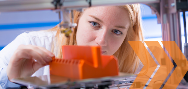 woman peering into 3d printing with plastics machine