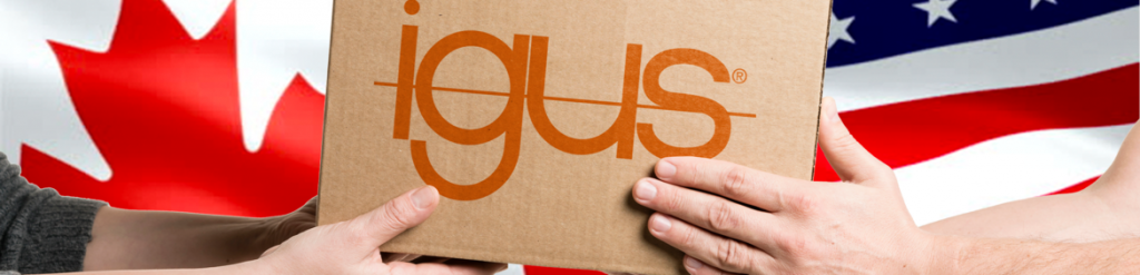 igus box between Canadian and US flags