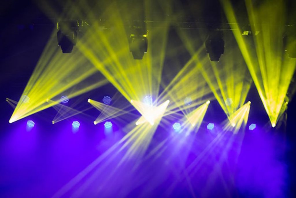 purple blue and yellow stage lights