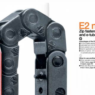 E2 micro catalogue cover with pencil tip next to a small cable carrier