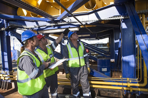Crew onboard a ship inspecting with clipboard
