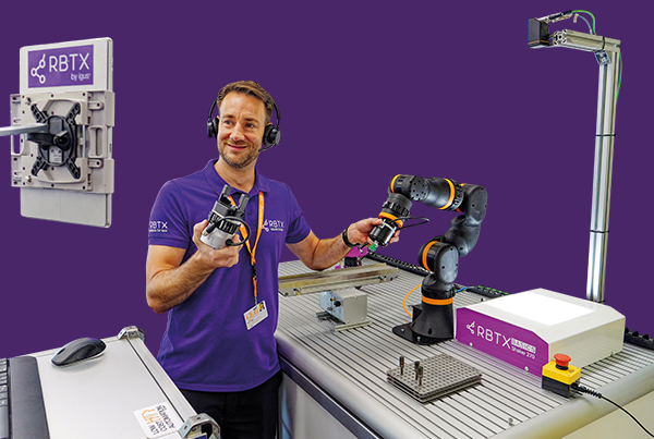 RBTX representative presenting a ReBeL cobot solution to a customer on a screen