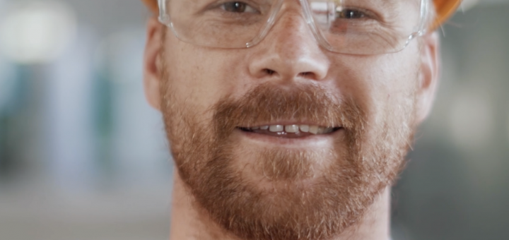 smiling engineer with hard hat