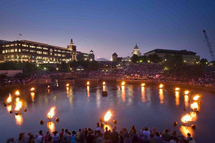 group of people in front of the WaterFire event in Rhode Island