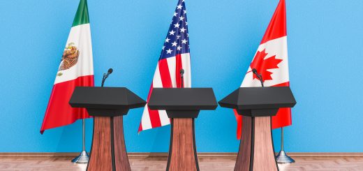 canada us mexico flags in front of mic'd podiums