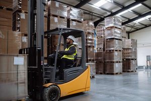 worker on a forklift